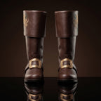 Pair, close together, buckles crossed: Pair of black leather Santa Claus boots with gold embroidered reindeer design on fold-over cuffs and engraved gold buckle straps
Pair, front-facing: Front view of black genuine leather Santa Claus boots showing gold thread reindeer embroidery and ornate gold buckle detail
Single boot, 3/4 profile: Single black leather Santa Claus boot with gold reindeer embroidery cuff and engraved buckle strap, side profile view